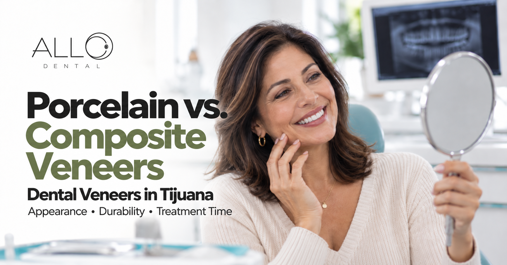 Smiling Latina patient reviewing her smile in a mirror during a dental veneers consultation in Tijuana